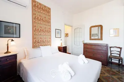 Letto o letti in una camera di Bright Gianturco 19