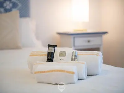 Letto o letti in una camera di La Finestra sul Corso
