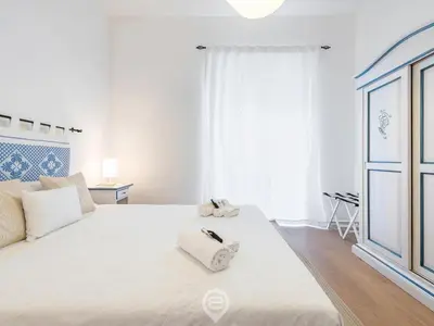 Letto o letti in una camera di La Finestra sul Corso