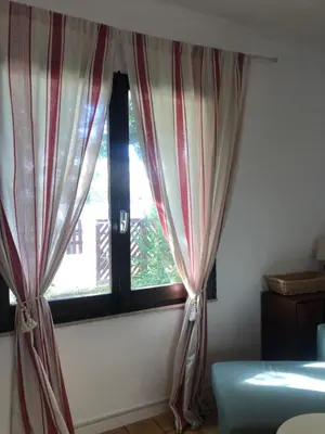 Letto o letti in una camera di Villetta Cody