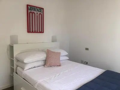 Letto o letti in una camera di Villetta Cody