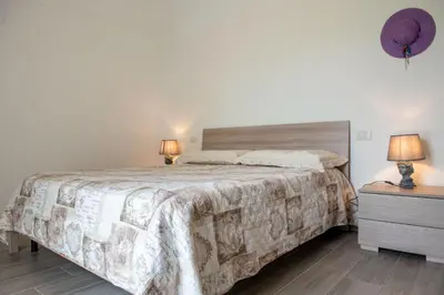 Letto o letti in una camera di In Campagna - Experience House