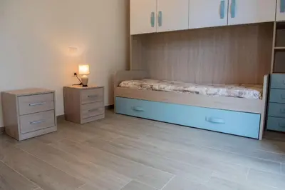 Letto o letti in una camera di In Campagna - Experience House