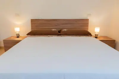 Letto o letti in una camera di In Campagna - Experience House