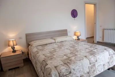Letto o letti in una camera di In Campagna - Experience House