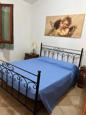 Letto o letti in una camera di Casa VALE