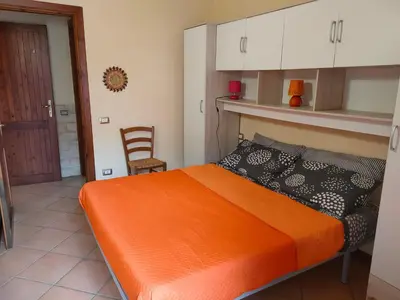 Letto o letti in una camera di casa la coccinella