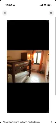 Letto o letti in una camera di Trilocale vicino alla spiaggia