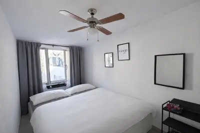 Letto o letti in una camera di Sa Domu Sa Canna mit 2 Schlafzimmern in Teulada!