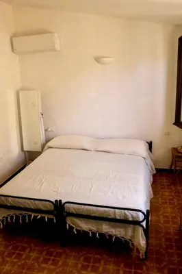 Letto o letti in una camera di Villa La Conchiglia