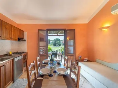 Cucina o angolo cottura di Apartment Baia delle Palme-3 by Interhome