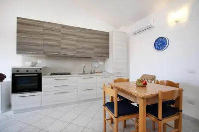 Cucina o angolo cottura di Casa MaGi - Sa Murta Apartments