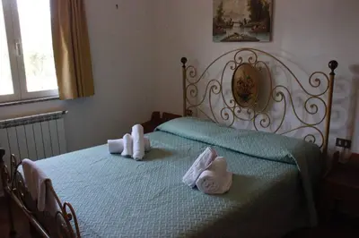 Letto o letti in una camera di Casa Orlando