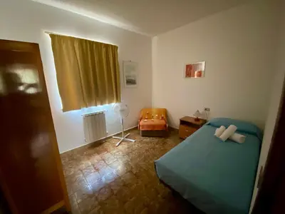 Letto o letti in una camera di Casa Orlando
