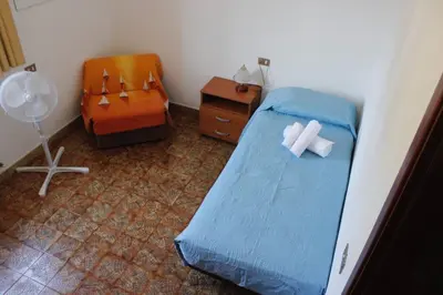 Letto o letti in una camera di Casa Orlando