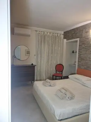 Letto o letti in una camera di Casa Cavallotti