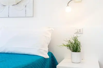 Letto o letti in una camera di Casa Bynos Supramonte vista mare B