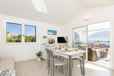 TV o dispositivi per l'intrattenimento presso Casa Bynos Supramonte vista mare B