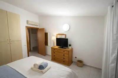 Letto o letti in una camera di Casa Stella Marina