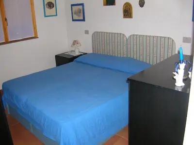 Letto o letti in una camera di Villa Silvia
