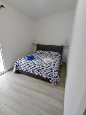 Letto o letti in una camera di CasAmedeo