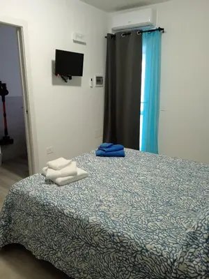 Letto o letti in una camera di CasAmedeo