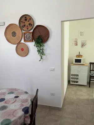 Letto o letti in una camera di Casa Barù - Gonnesa