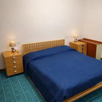 Letto o letti in una camera di Calamarina HOME HOLIDAY