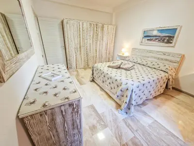 Letto o letti in una camera di Appartamento Le Pavoncelle