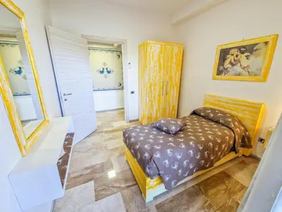 Letto o letti in una camera di Appartamento Le Pavoncelle