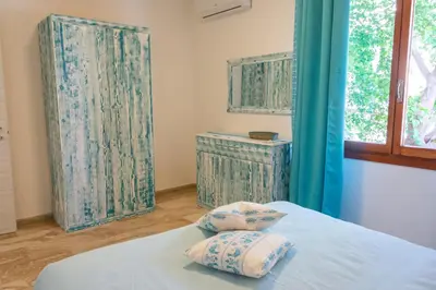 Letto o letti in una camera di Appartamento Le Pavoncelle