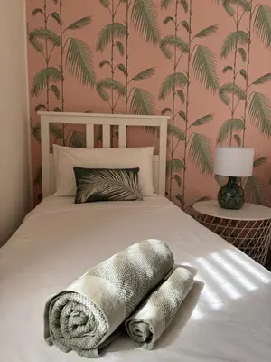 Letto o letti in una camera di Dòmo Anděl Sardinia