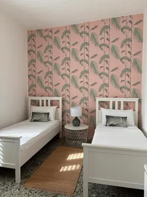 Letto o letti in una camera di Dòmo Anděl Sardinia