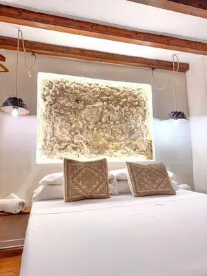 Letto o letti in una camera di Kalma Elephant Tower Guardians House - Historic Stay at Old Town