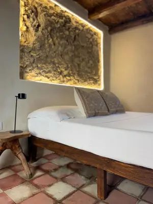 Letto o letti in una camera di Kalma Elephant Tower Guardians House - Historic Stay at Old Town