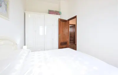 Letto o letti in una camera di Casa Mario