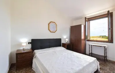 Letto o letti in una camera di Casa Mario