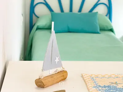 Letto o letti in una camera di Casa Chiara
