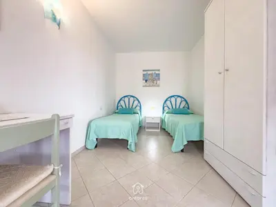 Letto o letti in una camera di Casa Chiara