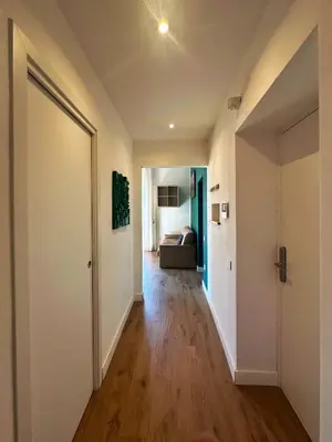 Letto o letti in una camera di Domus Avendrace