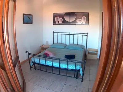 Letto o letti in una camera di Appartamento 89 P1