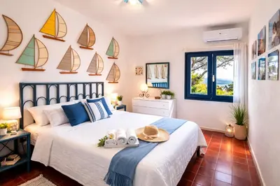 Letto o letti in una camera di Villa Il Gabbiano a few minutes walk from the sea