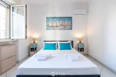 Letto o letti in una camera di Cozy 1BR near Poetto Beach