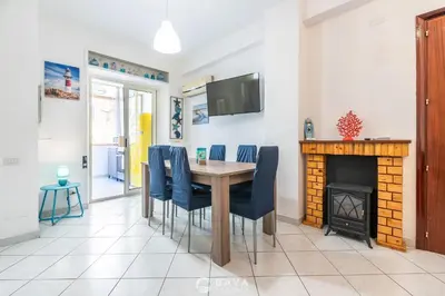TV o dispositivi per l'intrattenimento presso Cozy 1BR near Poetto Beach