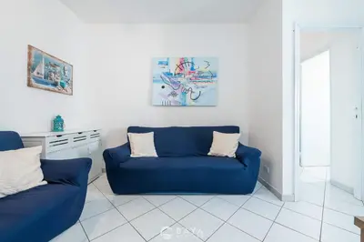 Area soggiorno di Cozy 1BR near Poetto Beach