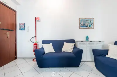 Area soggiorno di Cozy 1BR near Poetto Beach