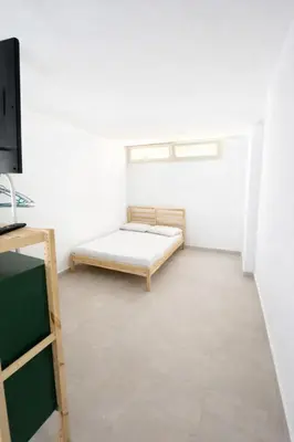 Letto o letti in una camera di Home Stay Apartment