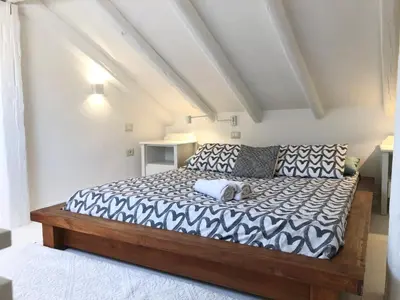 Letto o letti in una camera di Luxury loft centro storico