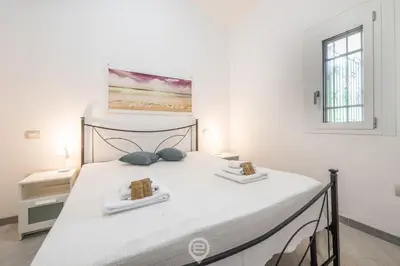 Letto o letti in una camera di Pinus Village Coastal Hideway