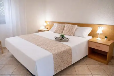 Letto o letti in una camera di Casa Prasciolu